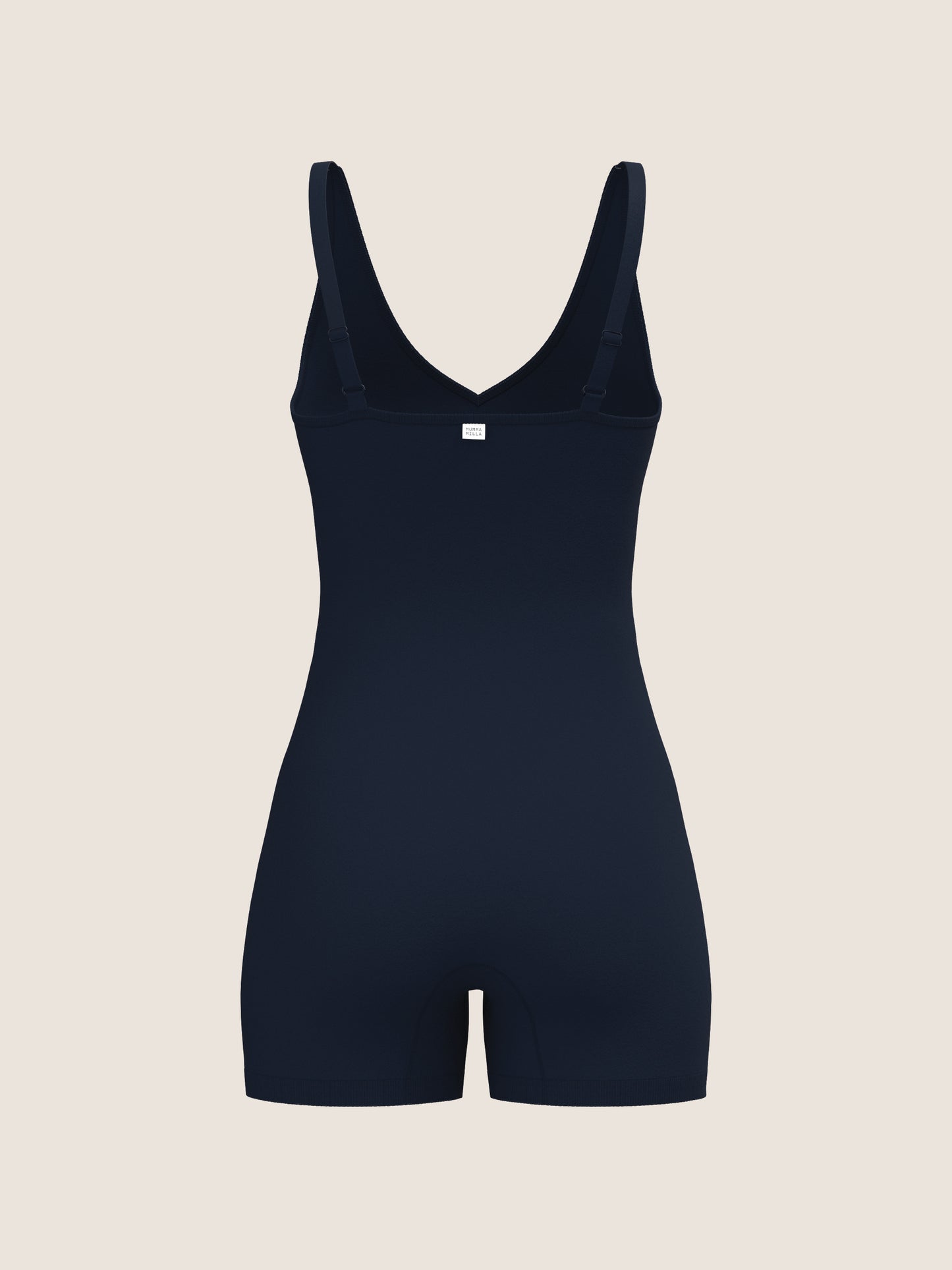 NAvy bodysuit on a beige background