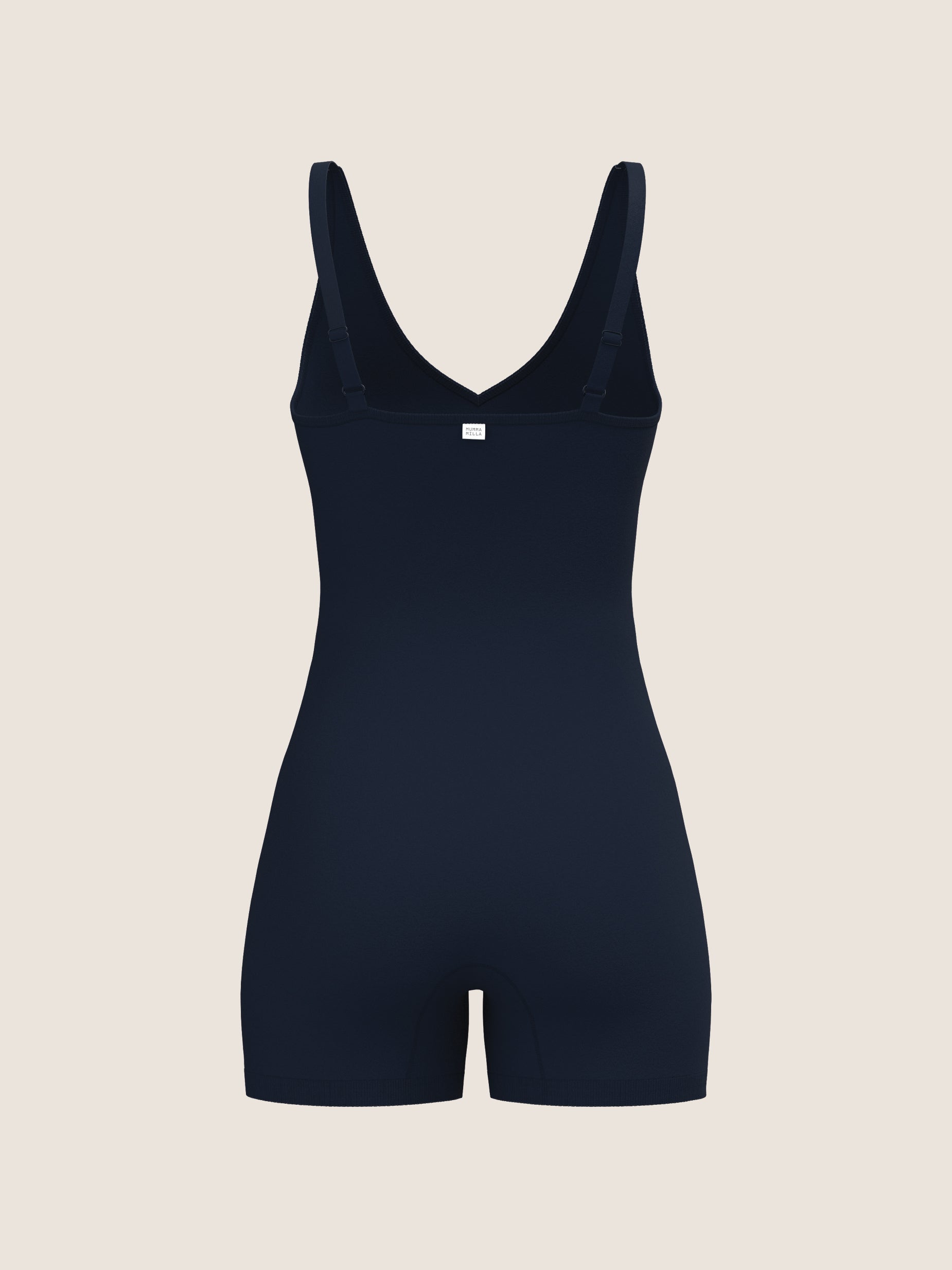 NAvy bodysuit on a beige background